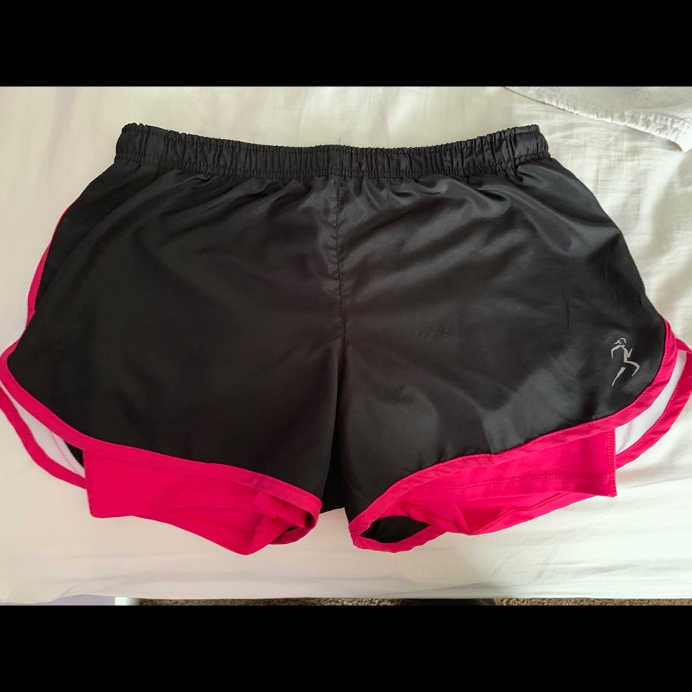 black and pink running shorts